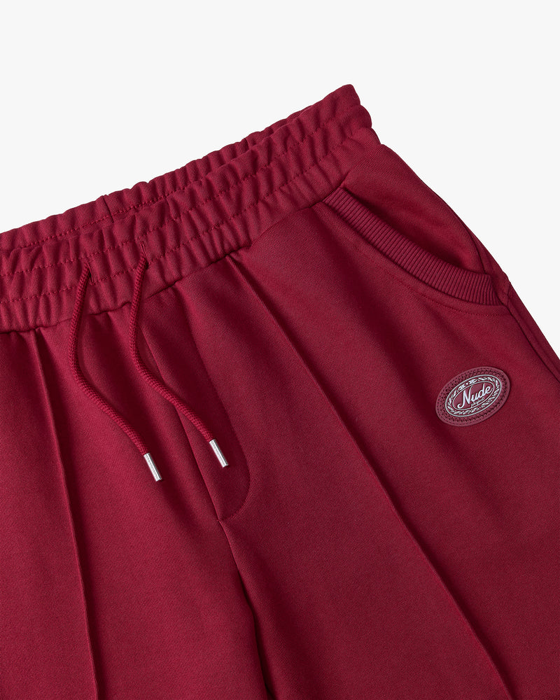 PANTALÓN CHÁNDAL BURGUNDY ESSENTIALS