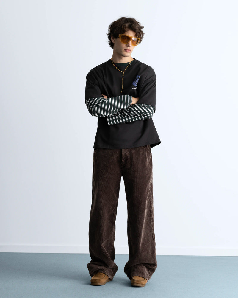 MAN [Model is 1.83 m / 6’0” wearing size M]