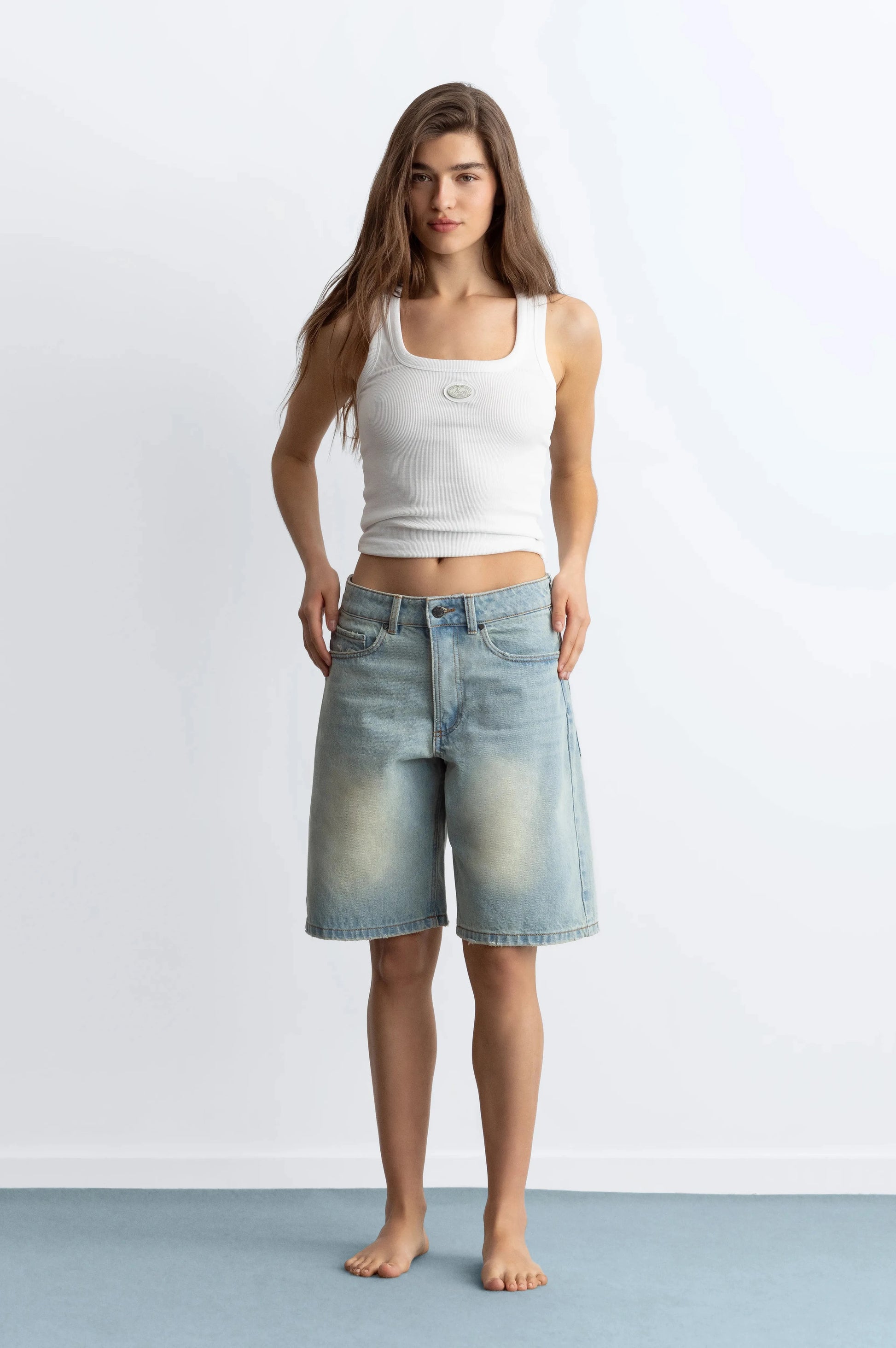 WOMAN [Model is 173 cm / 5’8” wearing size 38]