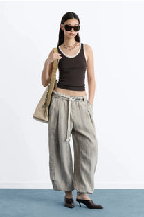 WOMAN [Model is 176 cm / 5’9” wearing size S]