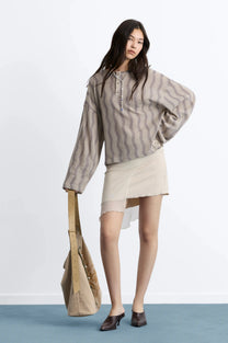 WOMAN [Model is 176 cm / 5’9” wearing size S]