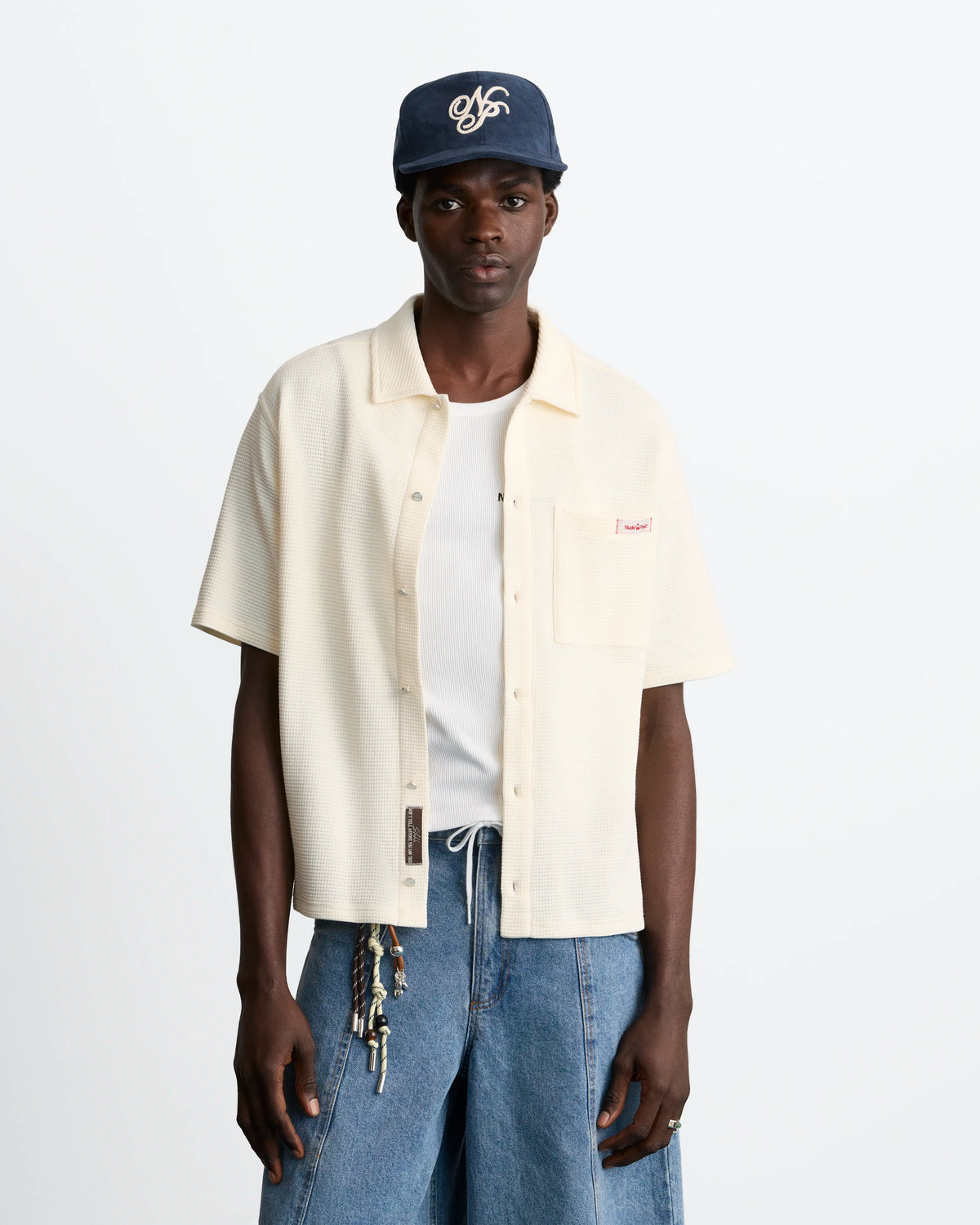 MAN [Model is 188 cm / 6’2” wearing size L]