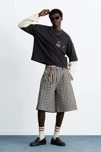 MAN [Model is 188 cm / 6’2” wearing size M]