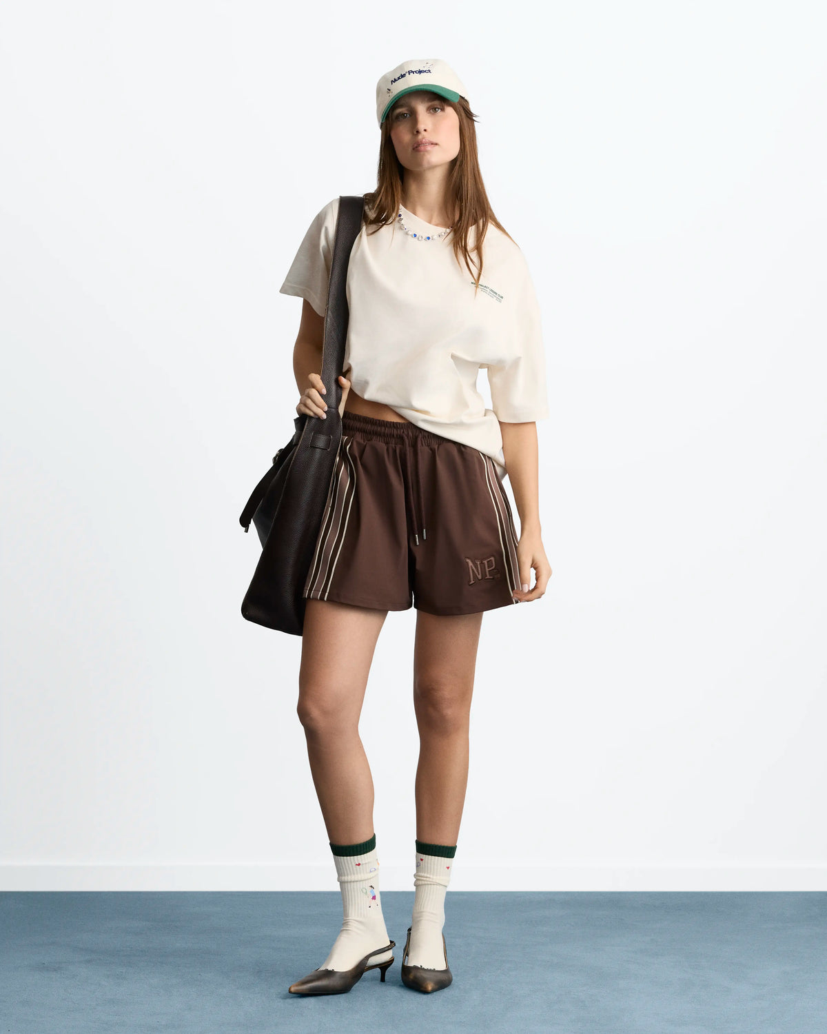 WOMAN [Model is 173 cm / 5’8” wearing size S]