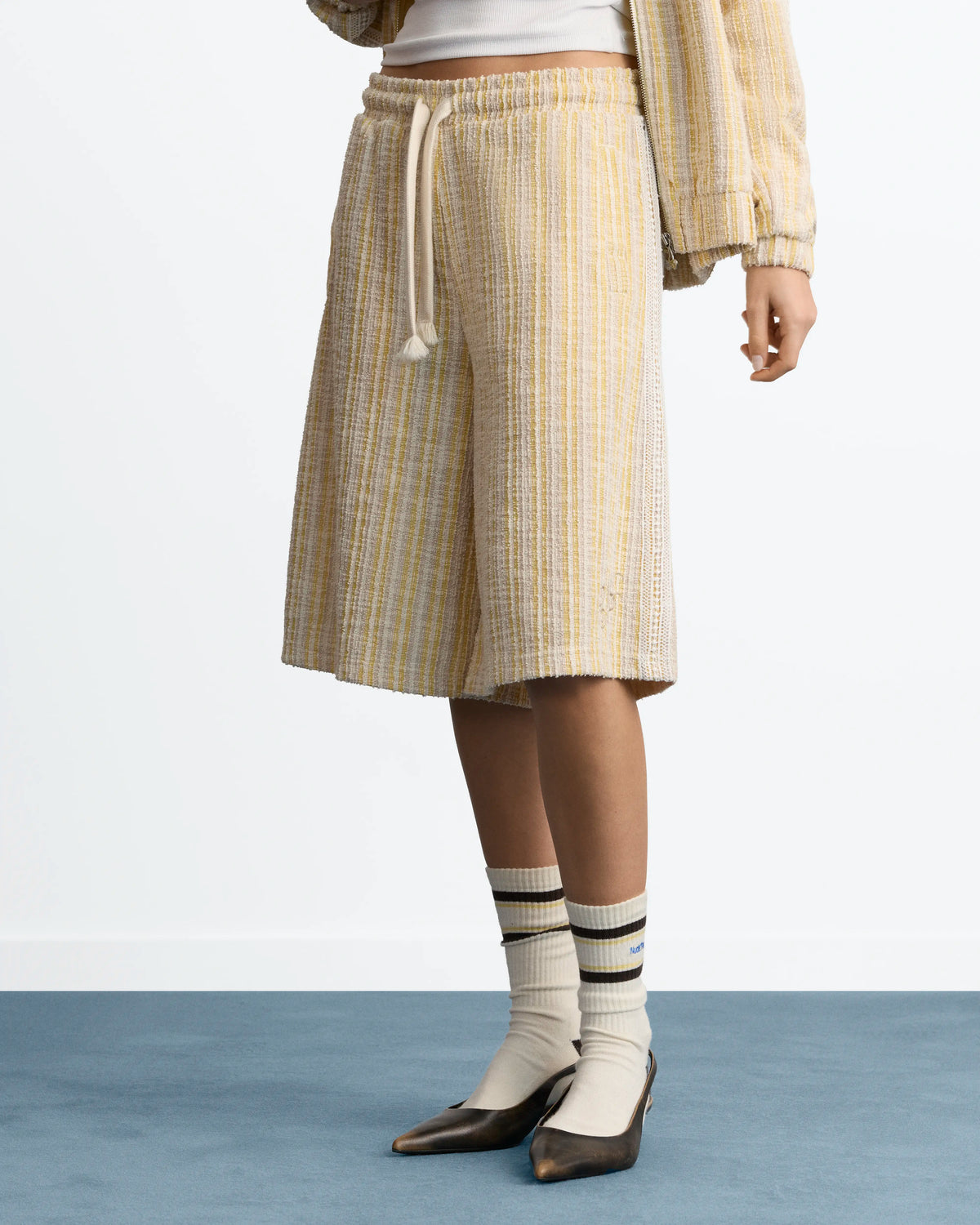 WOMAN [Model is 173 cm / 5’8” wearing size S]