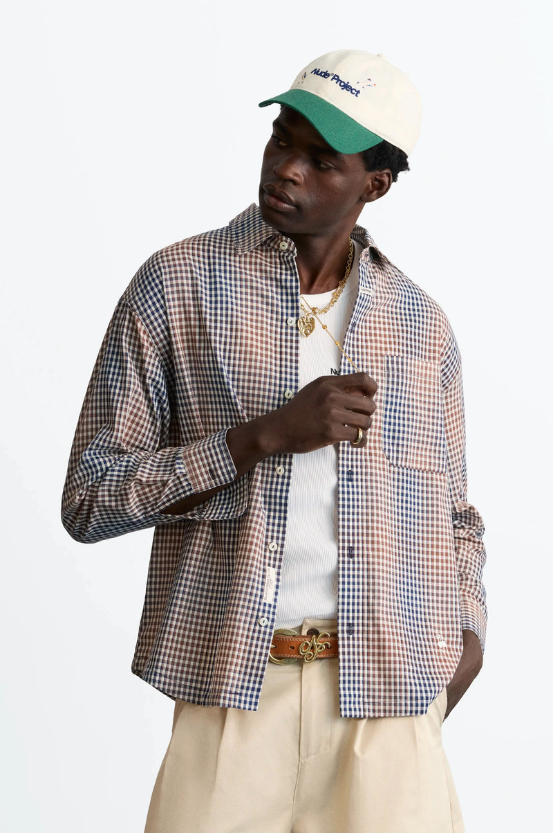 MAN [Model is 188 cm / 6’2” wearing size L]