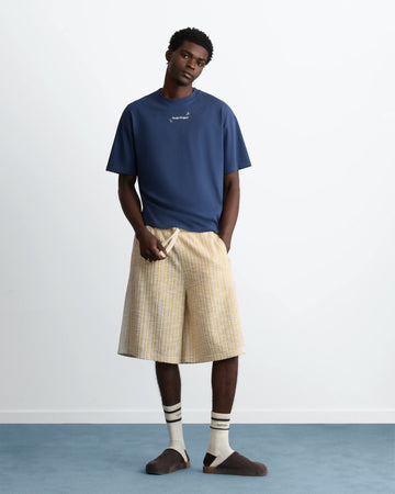 MAN [Model is 188 cm / 6’2” wearing size L]