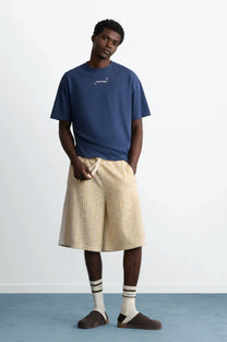 MAN [Model is 188 cm / 6’2” wearing size L]
