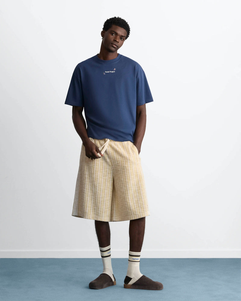 MAN [Model is 188 cm / 6’2” wearing size L]