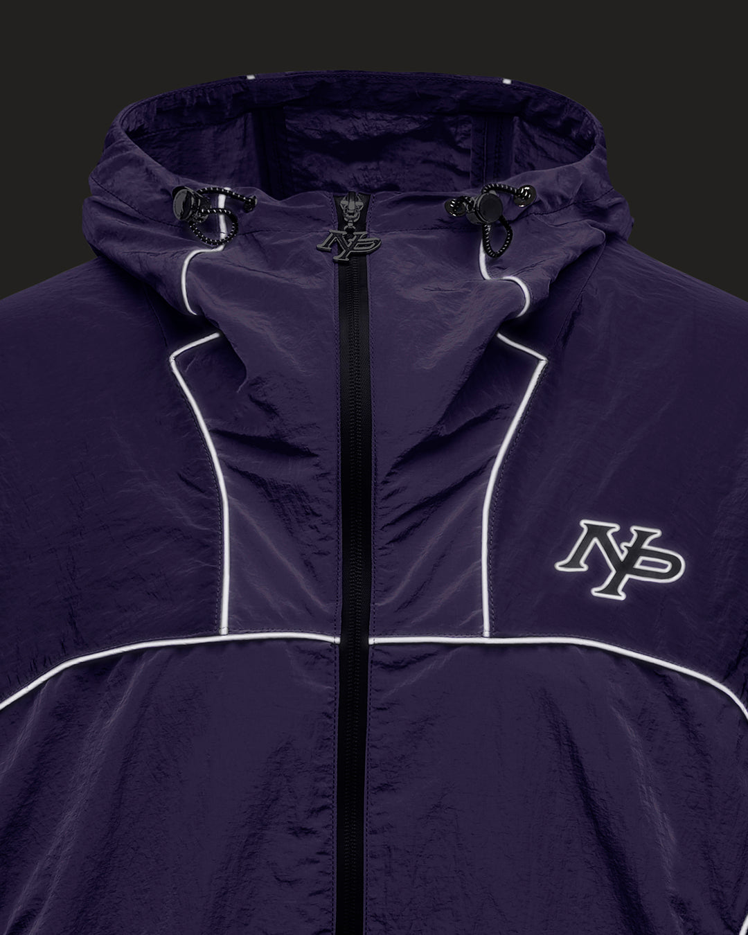 REFLECTIVE WINDBREAKER PURPLE – NUDE PROJECT